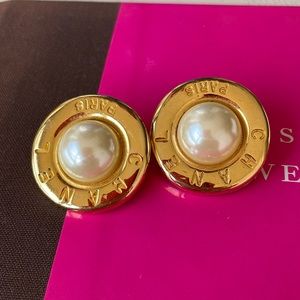 Gold clip ons with center pearl accent. NWOT
